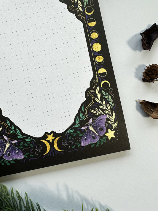 block notes con illustrazioni magiche