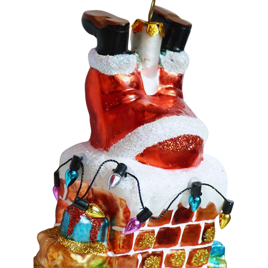 dettaglio babbo natale nel camino