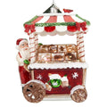Addobbo natalizio Babbo Natale al banchetto dei dolci, con tendina a righe rosse e bianche, biscotti e uccellino rosso