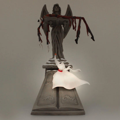 Nightmare before christmas - Jack Skellington su statua Angelo con Zero