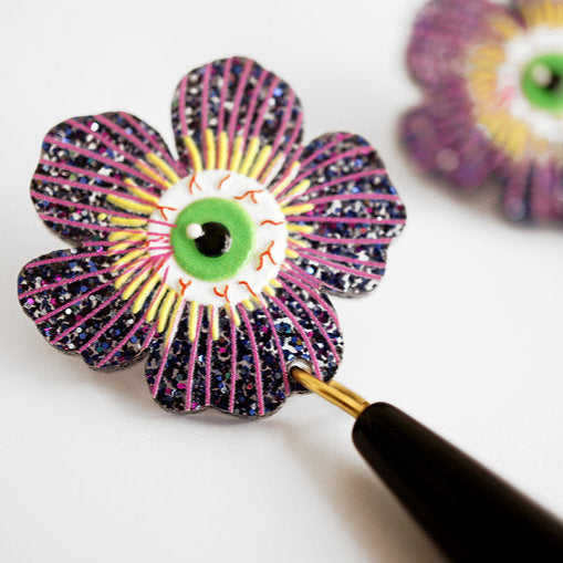 orecchino fiore dark con pendente