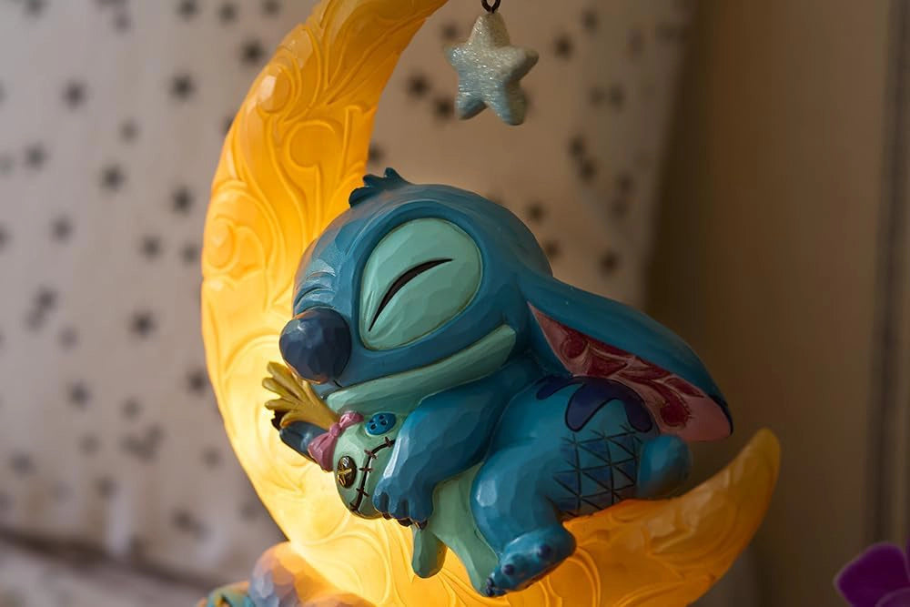 lampada accesa stitch e scrump su luna