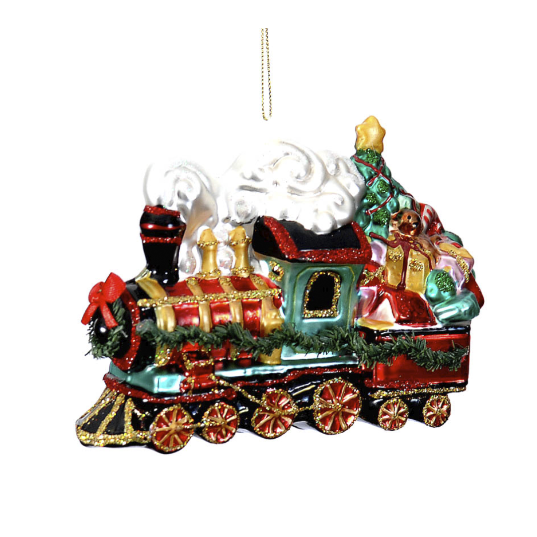 Addobbo di vetro a forma di locomotiva a vapore rossa, verde e oro con fumo bianco, ghirlanda di abete e vagone carico di regali e alberello