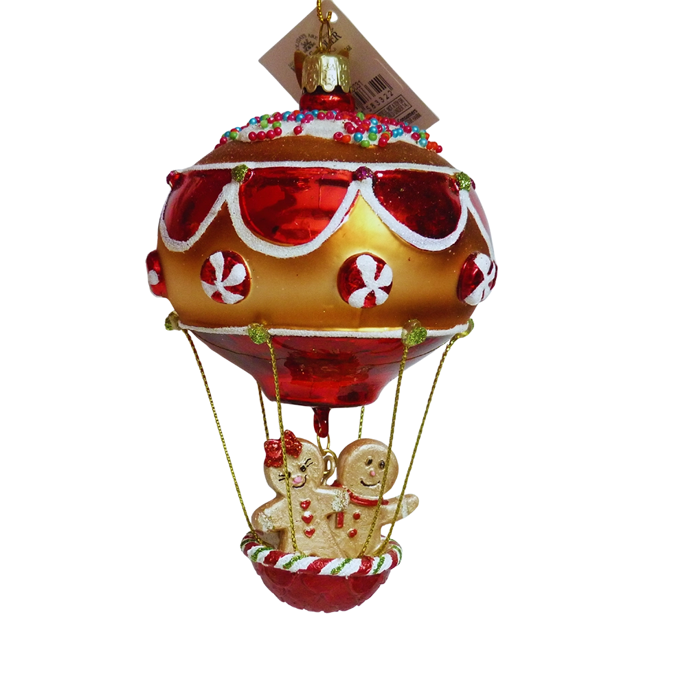 Addobbo di vetro a forma di mongolfiera con palloncino oro e rosso, caramelle di menta e due omini di pan di zenzero nel cestino