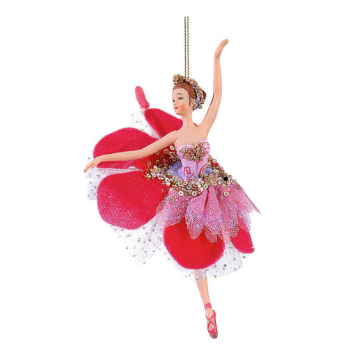 Ballerina in resina con gonna a petali di velluto fucsia, tulle rosa e paillettes dorate, un braccio alzato e piedi sulle punte rosa