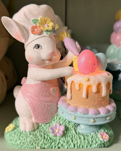 coniglietto pasticcere con uovo che s'illumina