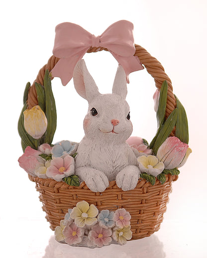 decorazione primaverile pasquale coniglio dentro cesto vimini con fiori e fiocco rosa