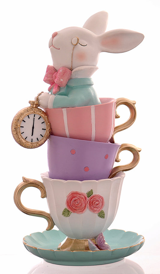 coniglio con orologio dentro tazze da tè