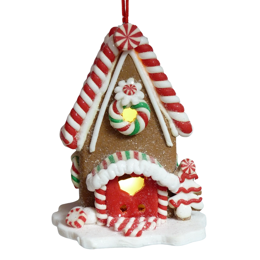 Fronte casetta di pan di zenzero marrone con tetto a bastoncini rossi e bianchi, porta rossa con cuore dorato e alberello di glassa illuminata