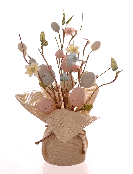 mazzo fiori e uova pasqua tonalità pastello