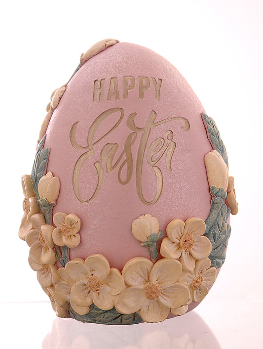 Uovo rosa decorativo con fiori "Happy Easter"